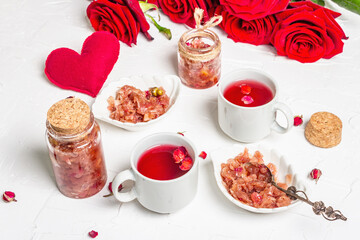 Tea time with rose petals jam and hot beverage
