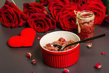 Homemade rose petals jam in bowl and glass jar