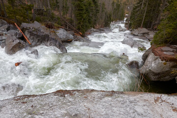Rush current of a river in the mountains.