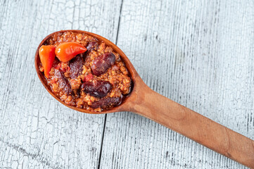 Spoon of chili con carne