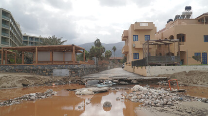 Malia Beach with washed up items after the big floodings on Crete Island in Greece.