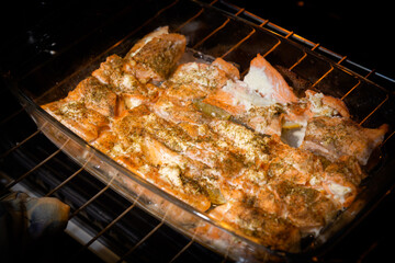 Fried salmon in the oven close-up