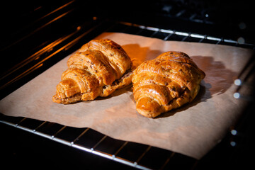 croissants in the oven close up. homemade sweets