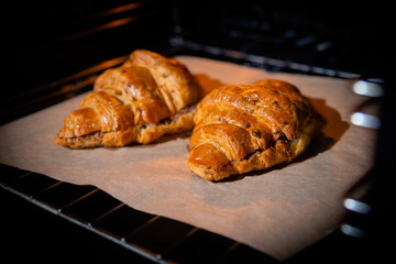croissants in the oven close up. homemade sweets