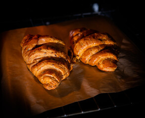 croissants in the oven close up. homemade sweets