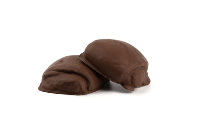 Two sweet buns in chocolate glaze on a white plate.