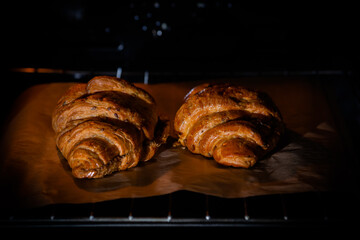croissants in the oven close up. homemade sweets