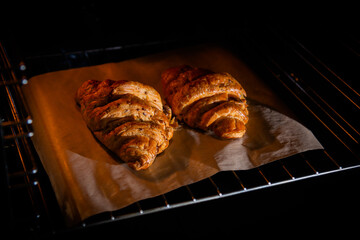 croissants in the oven close up. homemade sweets