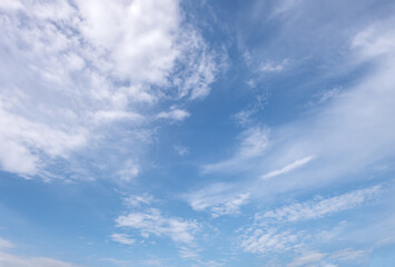 Fototapeta premium abstract background of white fluffy clouds on a bright blue sky