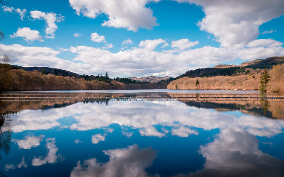 clouds mirroring on loch Faskally, Pitlochry. Picture taken from the dam