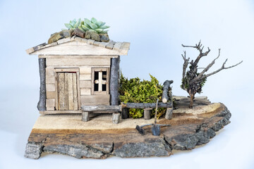 Fototapeta premium Model house model transformed into art with manual labor