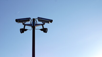 security video surveillance cameras against sky