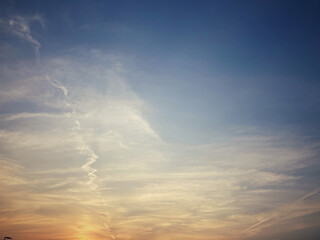 Naklejka na ściany i meble Evening sunset clouds