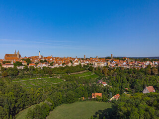 Fototapeta na wymiar Above the roofs of Rothenburg ob der Tauber on a sunny summer day