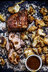 Honey dijon roasted turkey thighs with cauliflowers..