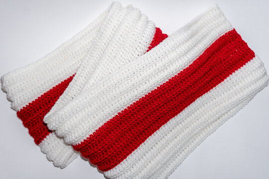 White red white knitted scarf on white background
