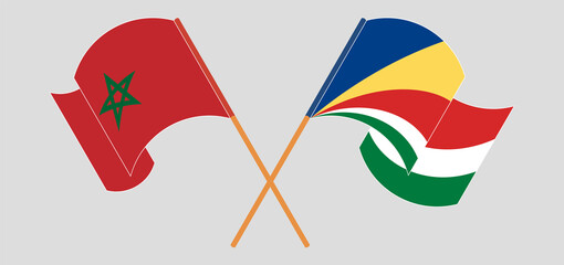 Crossed and waving flags of Morocco and Seychelles