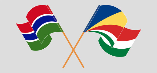 Crossed and waving flags of the Gambia and Seychelles