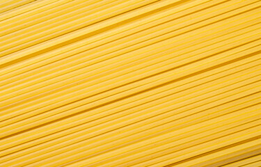 Top view, closeup of spaghetti pasta. Food backdrop