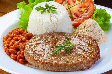grilled hamburger meat on the grill