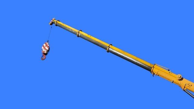A Hydraulic Mobile Crane Arm Being Extended And Then A Hook Being Lowered, With Copy Space