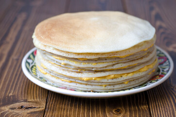 Pancake cake with lemon curd and cream
