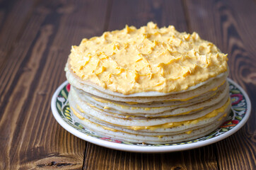 Pancake cake with lemon curd and cream