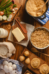 Conception of preparing brazilian snacks chiken croquette (coxinha de frango) - Top view