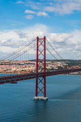 Obraz premium Picture of the famous bridge that cross the Tajo river in Lisbon, Portugal.