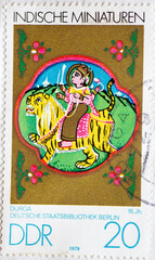 GERMANY, DDR - CIRCA 1979 : a postage stamp from Germany, GDR showing an Indian miniatures: Durga (18th century)