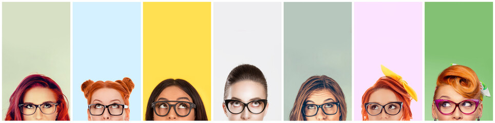 crop portrait cute women in glasses looking up - obrazy, fototapety, plakaty