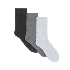 Set of short socks white, grey, black isolated on white background. Three pair of socks in different colors. Sock for sports on invisible foot as mock up for advertising, branding, design.
