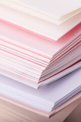 Close-up pink and white pages of a open book