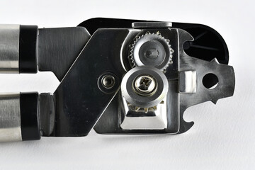Metal can opener isolated on a white background