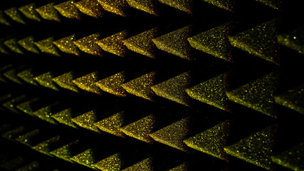 Background image of recording studio sound dampening acoustical foam.