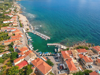 Fototapeta na wymiar Aerial scenic view over the seaside village Agios Nikolaos and the picturesque old port near Kardamyli, Peloponnese