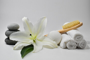 Various accessories for personal hygiene and body care with lily flower. Spa.