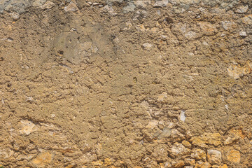 Old, rustic corroded and damaged stone and plaster wall. High quality texture and background for your projects and creative work