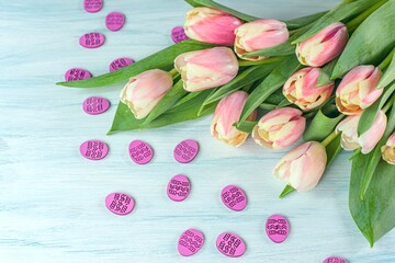 pink tulips on table, Easter background .