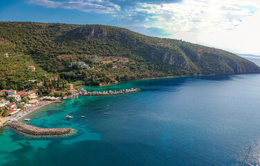 Naklejka premium Aerial panoramic view of the beautiful coastal village Kitries, located near Kardamili about half an hour from Kalamata city, Messenia. Amazing summer scenery in the Messenian Gulf, Greece
