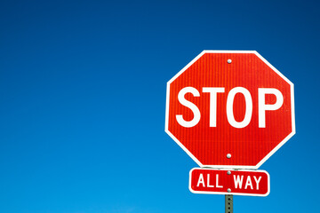 stop sign on blue sky