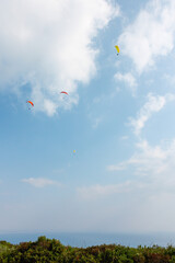 Paragliders over the mountains, Parque Natural da Arrábida, Setúbal, Portugal