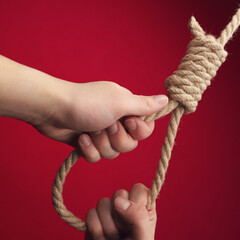 hands hold the hanging Lynch's loop