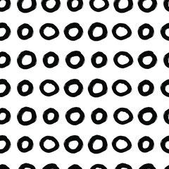 Grunge texture seamless pattern of different circles. Black stains design elements on white background. Vector illustration for wallpaper, greeting card, wrapping paper, textile, cover