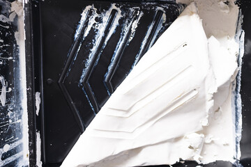 paint tray with solidified dry paint getting removed in one layer, DIY and home improvement