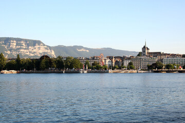 Obraz premium river, city, water, bridge, panorama, view, architecture, travel, europe, city, sky, blue, landscape, sea, night, tourism, skyline, geneva, switzerland, cityscape, harbor, panoramic, lake, urban, old,