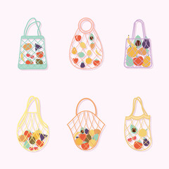 set of eco bags with a fruits inside of it on a pink background
