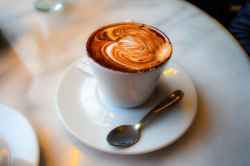 Nice cup of cappuccino coffee in a Barcelona restaurant
