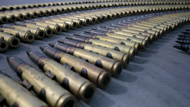 Tape of large-caliber aviation cartridges.