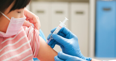 doctor making COVID19 vaccination